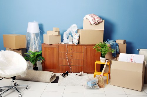 Business relocation setup with labelled boxes and workspace items