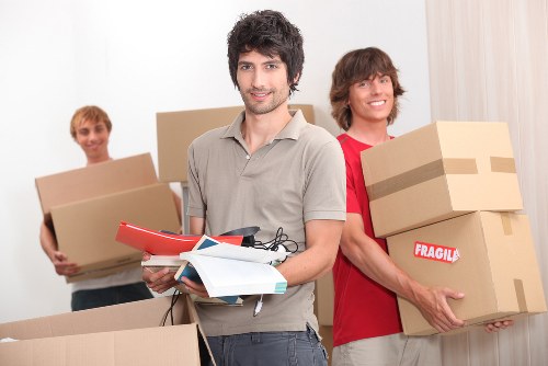 Office furniture, boxes, and equipment prepared for relocation