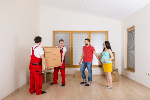 Moving boxes and furniture loaded for a Man And Van Wallington service