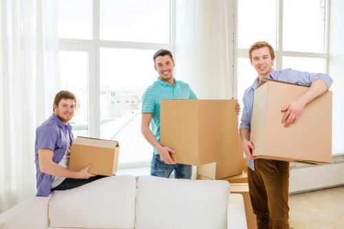 Local moving team loading furniture for a Wallington relocation