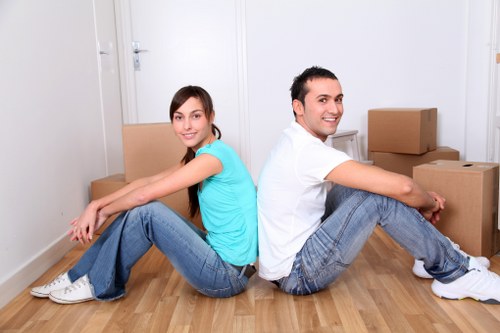 Packed moving boxes and household items prepared for a home move in Wallington