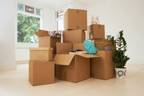 Professional team handling bulky furniture collection in Wallington