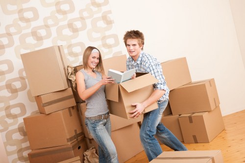 Professional team handling bulky furniture with care in Wallington