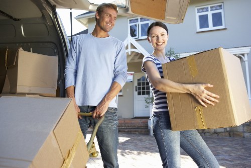 Professional student moving van loading boxes and furniture in Wallington