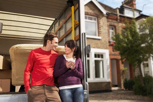Professional movers loading office furniture for removals in Wallington