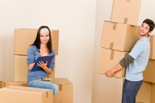 Professional movers handling furniture during a Wallington house move
